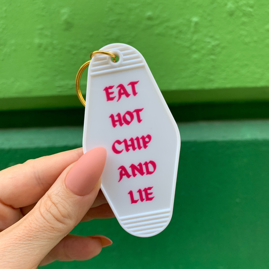 Eat Hot Chip and Lie Motel Style Keychain in White